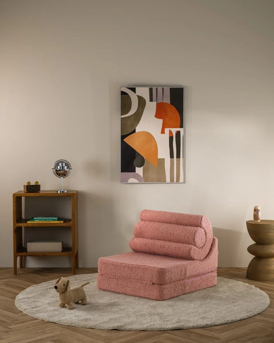 Wigiwama Flipster chair in pink, a soft modular kids chair in a modern living room setting